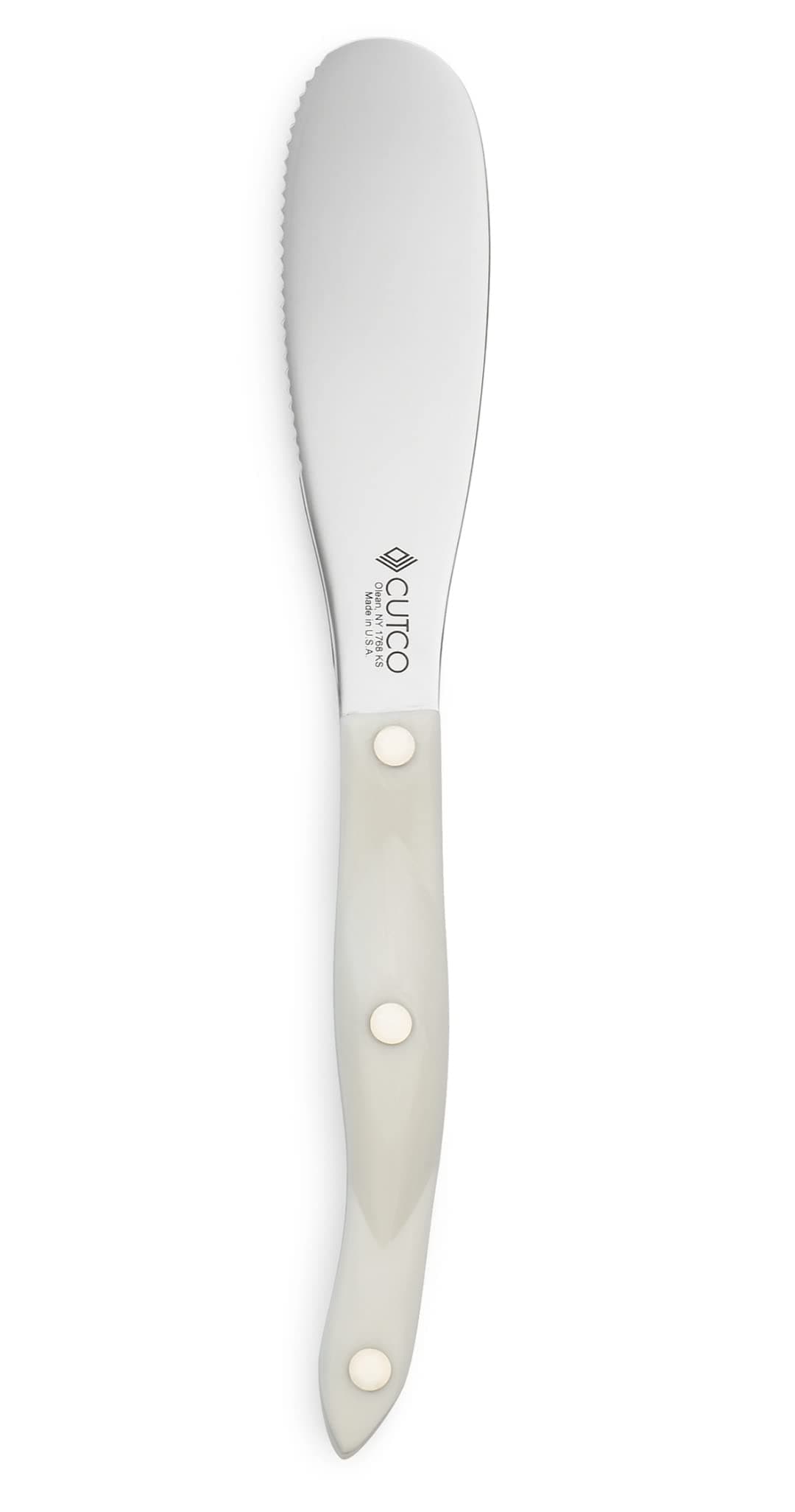 CutcoModel 1768 Spatula Spreader with Classic Black handle. 4.9" High Carbon Stainless Double-D® serrated edge blade 5.1" handle in factory sealed plastic bag.