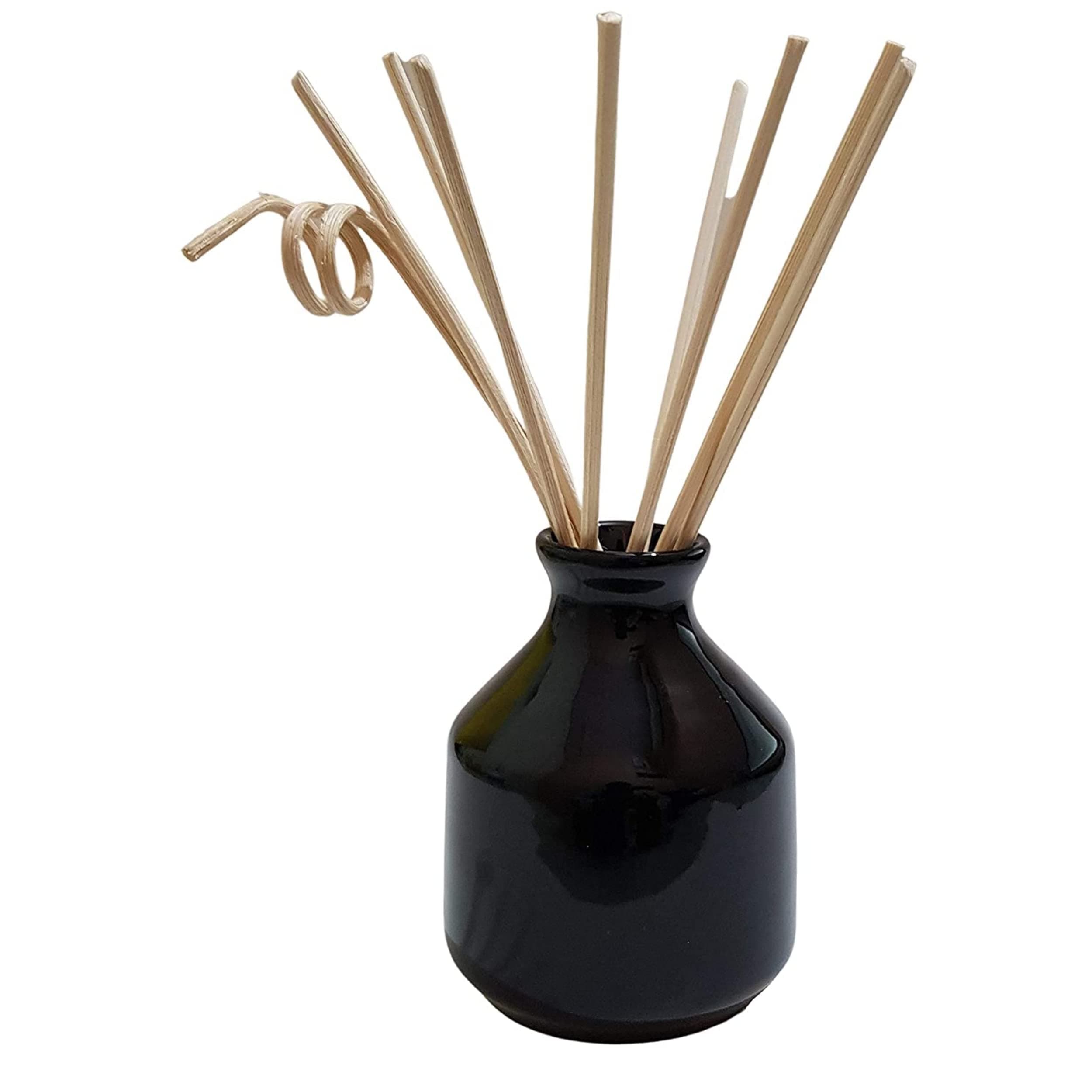 reed diffuser pot 3.5 inch tall Black color , and 8 reed sticks ,capacity of this pot is about 100 ML,You can put your own choice reed diffuser oil in it .the Vase is very good in terms of quality and finish . (Black Pot)